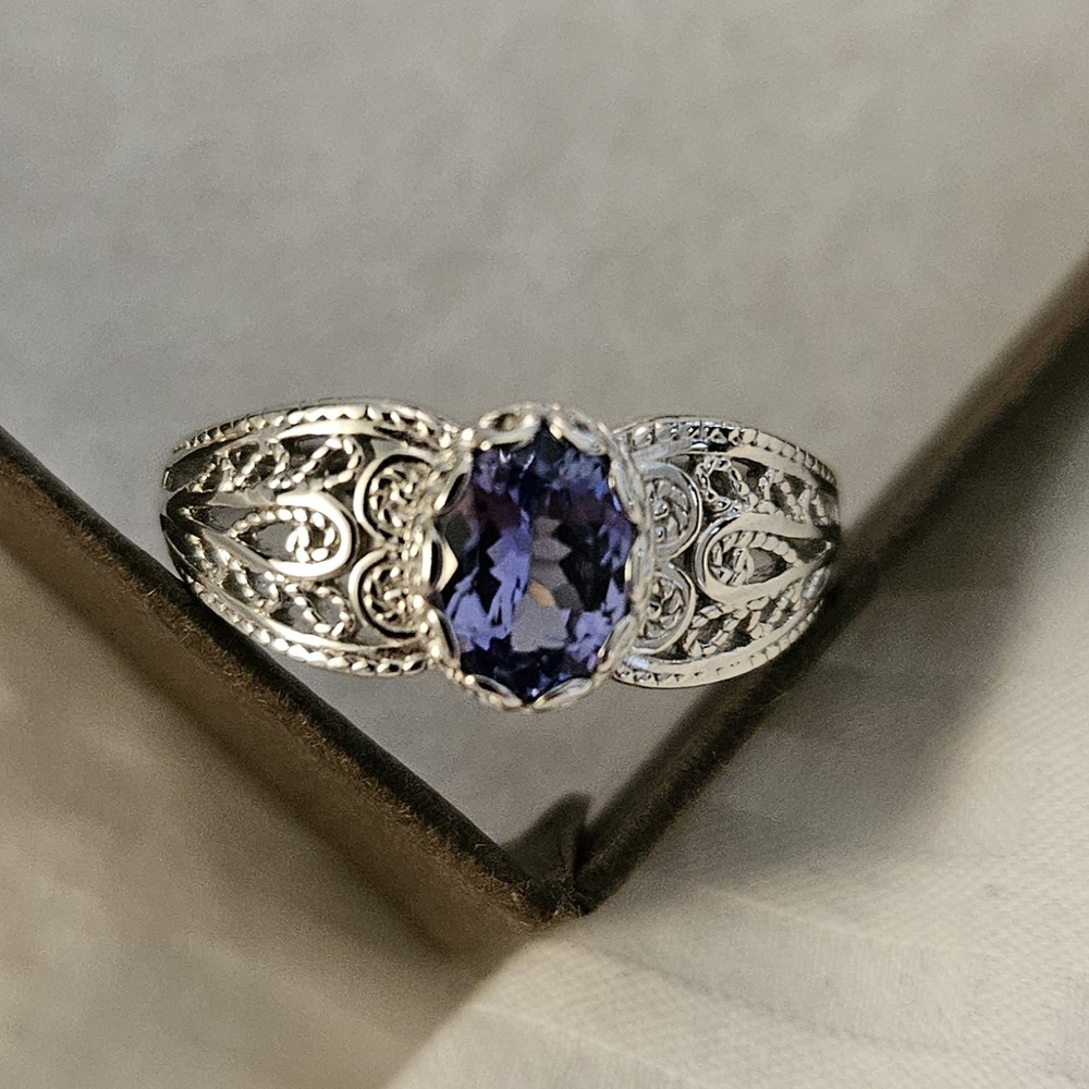 Elegant .65CT Oval Tanzanite Rhodium Over Silver Women's Ring